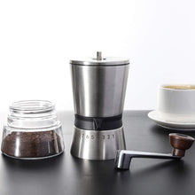Load image into Gallery viewer, Stainless steel manual grinder with removable glass catch jar.
